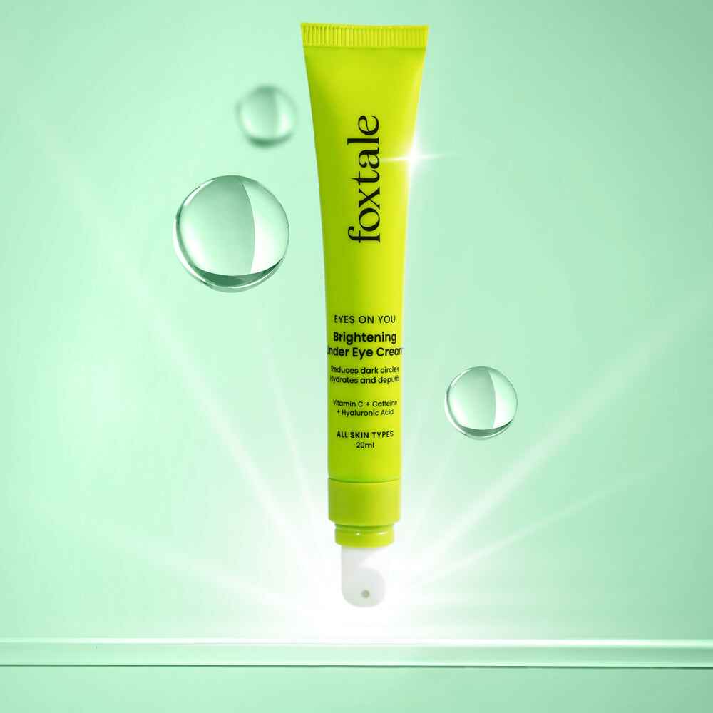 Foxtale Brightening Under Eye Cream with Vitamin C, Caffeine & Hyaluronic Acid for dark circles, puffiness, and hydration.